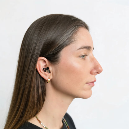 Veluno Pulse earplugs worn in ear